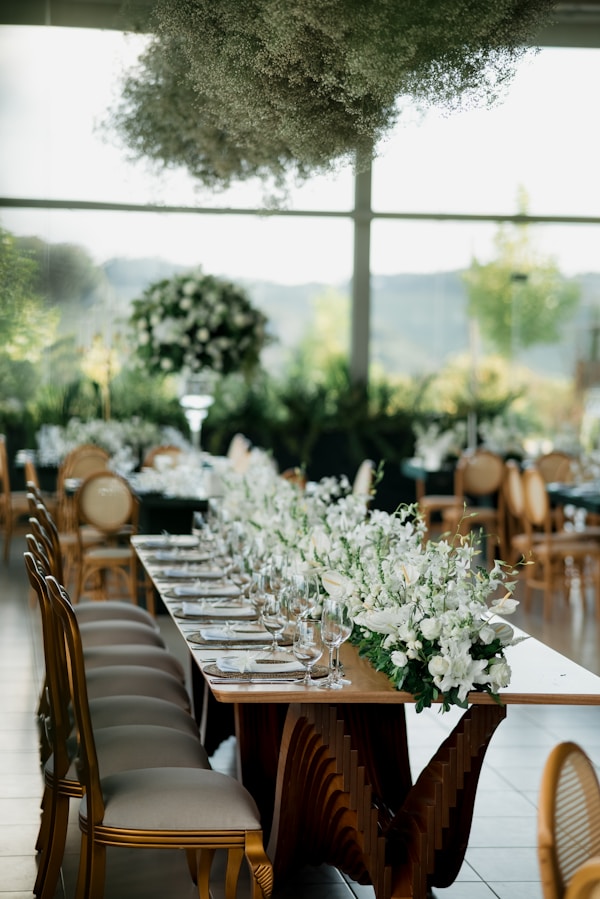 Decorative chair sashes on wedding chairs — Gulf Coast Event Rentals